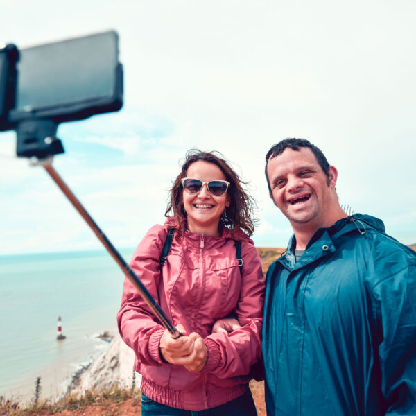 Man & woman taking a selfie photo